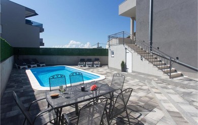 Awesome Home In Split With Outdoor Swimming Pool, Sauna And 4 Bedrooms