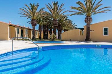 Апартаменты Apartamento con piscina y terraza en Ciutadella, Cala en Blanes