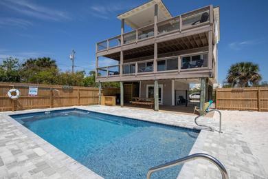 Holiday home Completely updated, new private pool, awesome patio and only steps to beach!