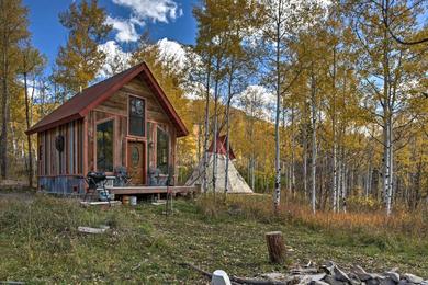 Дом отдыха Colorful Cabin with Teepee, Fire Pits and Mtn Views!