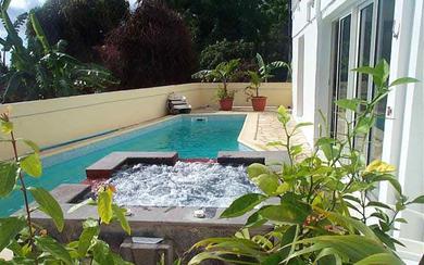 Дом отдыха Maison de 2 chambres avec piscine partagee jardin clos et wifi a Bois des Nefles Saint Paul