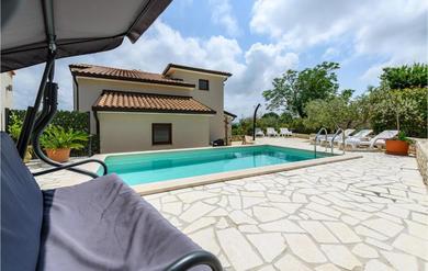 Holiday home Amazing home in Nova Vas with WiFi, Outdoor swimming pool and 4 Bedrooms