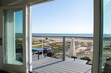 Апартаменты Luxury Beachfront Condo - Endless Views - Surf 1