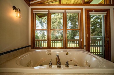 Villa Luxury Riverside Estate - 3BR Home or 1BR Cottage or BOTH - Sleeps 14 - Swim, fish, relax, refresh