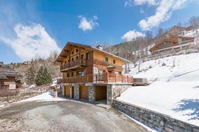 Chalet Chalet Himalaya , 10 Person Chalet with 5 ensuite bedrooms and outdoor jacuzzi in Meribel Centre