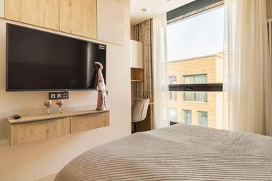 Apartments Охта Парк Люкс Resort с сауной и камином с одной или двумя спальнями
