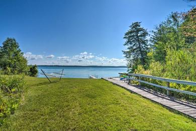 Holiday home Torch Lake Home with 116 feet of Blue Water Access!