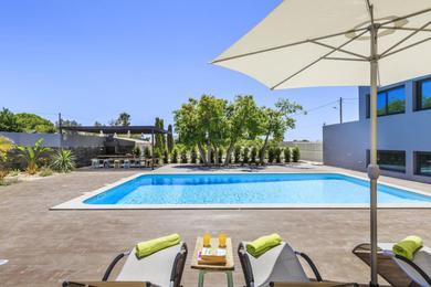 Вилла 3 bedrooms villa with sea view shared pool and enclosed garden at Quelfes 4 km away from the beach