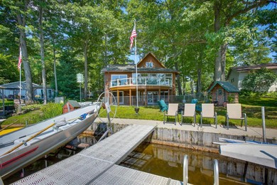 Lakefront Cadillac Retreat with Sauna and Boating!
