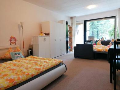 Апартаменты Ferienwohnung Schöne Wohnung 2d-Gebäude mit Mini-garten