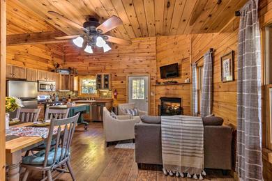 Дом отдыха Log Cabin with Deck and Fireplace Walk to Lake and Trails