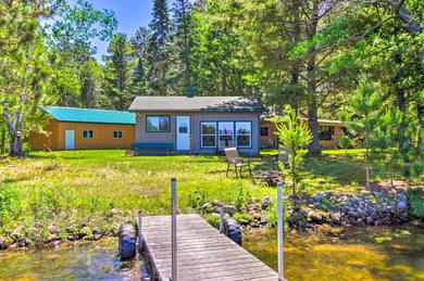Cozy Longville Cabin with Private Boat Dock!