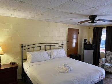 Hotel JI4, King Guest Room at the Joplin Inn at entrance to the resort Hotel Room