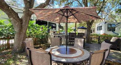 Private RV Rental A Turn-Key Glamping Package w Tiki Hut and Golf Cart 182