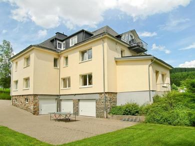 Апартаменты Large apartment in the beautiful Sauerland with garden, patio and sauna