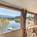 Апартаменты Luxe Lakefront Haven with Mountain Views and Dock