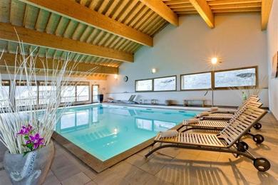 Апартаменты Appartement d'une chambre avec piscine partagee sauna et balcon a Orelle