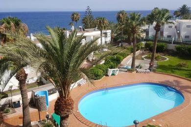 Apartments Apartment with 2 bedrooms in San Bartolome de Tirajana with wonderful sea view shared pool and WiFi 150 m from the beach