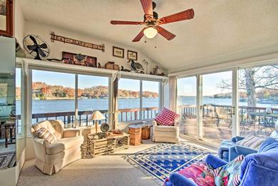 Lakefront House with Wraparound Deck and Sunroom!