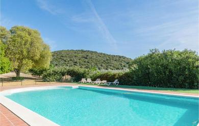 Holiday home Amazing home in Lora del Rio with Outdoor swimming pool, WiFi and 3 Bedrooms