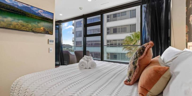  Marvelous Downtown Apartment Moments from Main Beach with Heated Pool, Gym and Parking