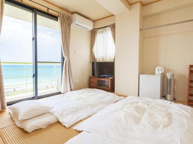 Апартаменты Kariyushi Condominium Ocean Hills Chouraku Stay