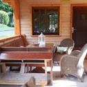 Шале Cozy chalet with fireplace, located in wooded area