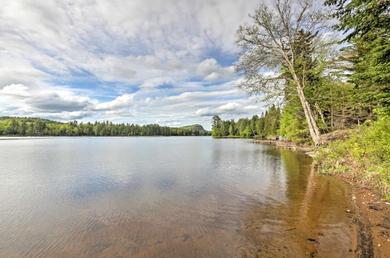 Дом отдыха Lakefront Old Forge Home with Private Boat Ramp and Beach