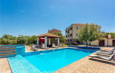 Stunning Home In Sveti Vid Dobrinjski With 6 Bedrooms, Wifi And Heated Swimming Pool