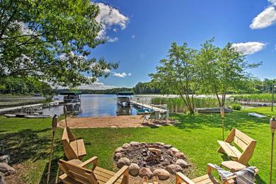Waterfront Getaway with Beach, Paddle Boat, Fire Pit