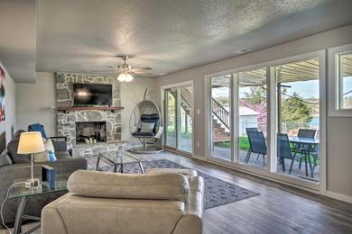Chic Lakefront Home with Deck Less Than 1 Mi to Marina!