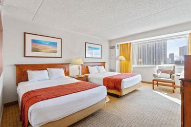Отель CozySuites Showboat Modern Beachside Hotel Room