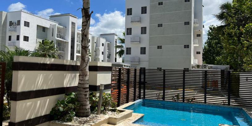 Апартаменты Coqueto apartamento amueblado con piscina.