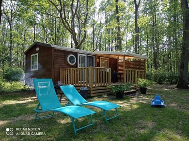 Hotel Location mobil-home,ile de France,avec piscine,havre de paix au coeur d' une forêt