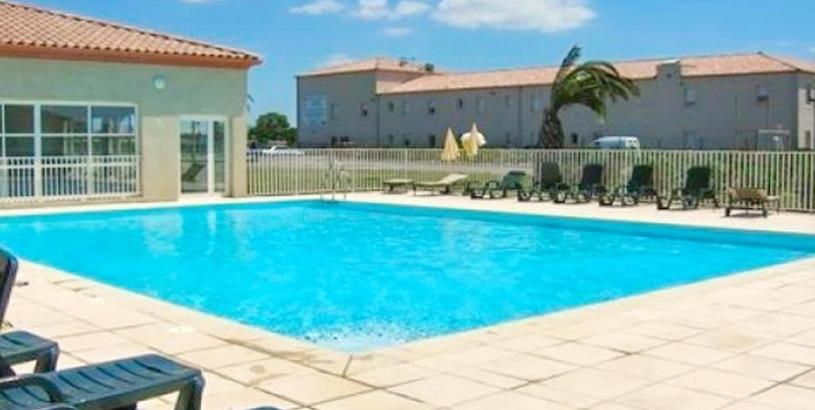 Holiday home Maison de 2 chambres avec piscine partagee et jardin amenage a Gallargues le Montueux
