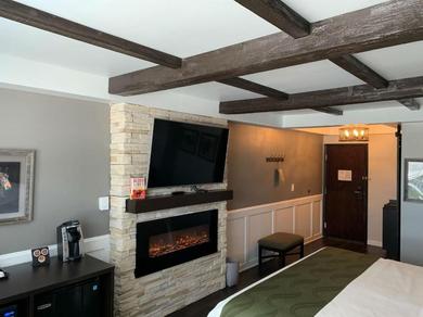 Отель Cedar Stables Inn & Suites