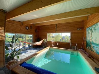 Дом отдыха Maison avec piscine intérieure chauffée,sauna, et billard
