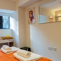 Апартаменты Stylish 2 Bed Apartment, Stunning City Centre Location, with FREE Secure, Gated Parking On-Site & Private WiFi, with Private Entrance & Courtyard Garden & Highly Rated