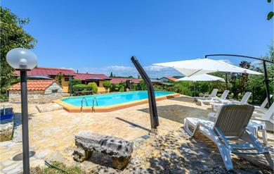 Apartments Awesome apartment in Rovinjsko Selo with Outdoor swimming pool, WiFi and 2 Bedrooms
