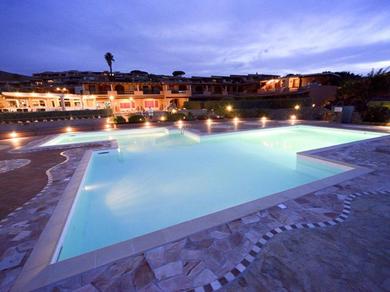 Holiday home Tasteful holiday home in Marinella with shared pool