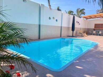 Holiday home Casa de playa + WIFI, piscina y áreas verdes