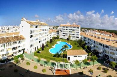 Апартаменты 3 bedrooms appartement with city view shared pool and terrace at El Portil 1 km away from the beach