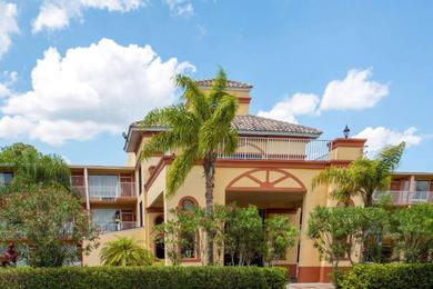 Отель Howard Johnson by Wyndham Tropical Palms Kissimmee