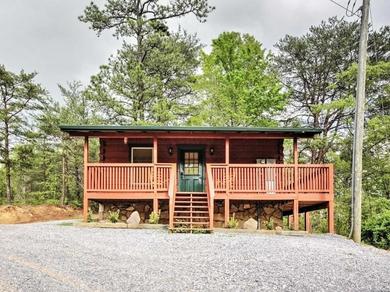 Apartments Log Cabin Studio in Sevierville with Deck and Hot Tub!