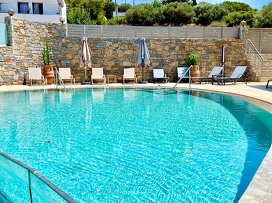 Отель Modern Family apartment Ewa with pool, dining area near Crete coast
