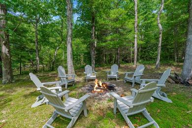Lakefront Cottage w Hot Tub, Fire Pit, WiFi, Grill & Screened-In Porch