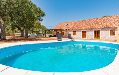 Holiday home Awesome home in Drinovci with Outdoor swimming pool, WiFi and 2 Bedrooms