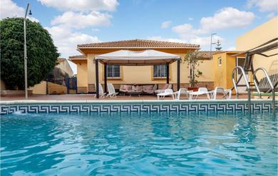 Holiday home Stunning home in El Portil with Outdoor swimming pool, WiFi and 4 Bedrooms