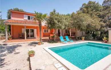Holiday home Awesome home in Barbariga with Outdoor swimming pool, WiFi and 3 Bedrooms