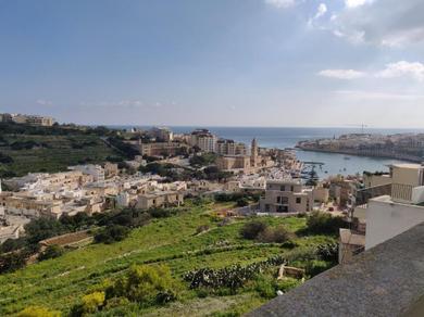 Apartments Panoramic Penthouse in Marsascala which enjoys sea and country views